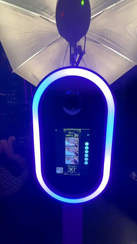 Our LED photo booth glowing at an evening event